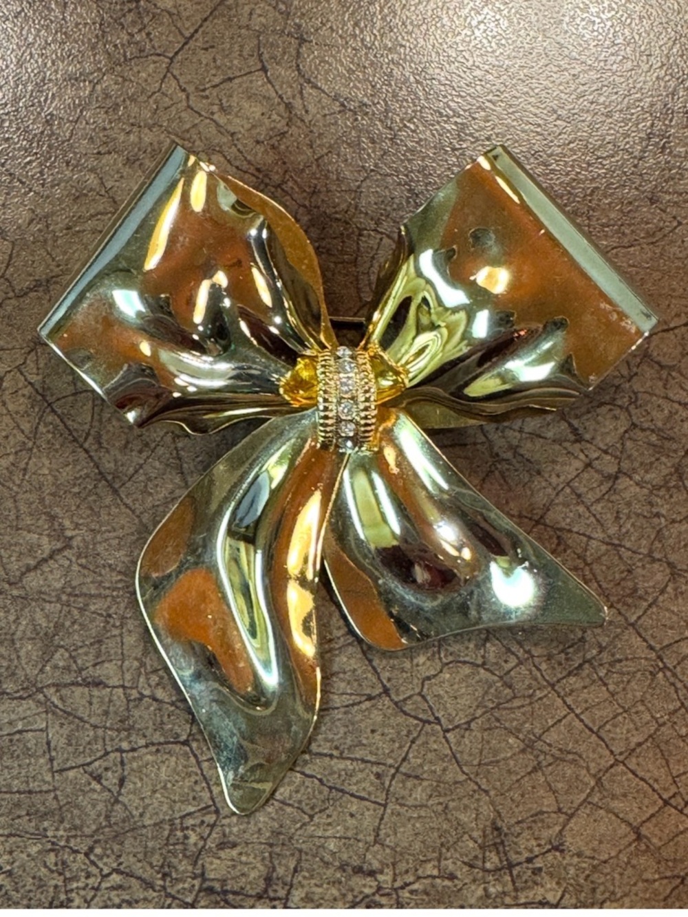 Gold Bow Brooch with Rhinestone Center